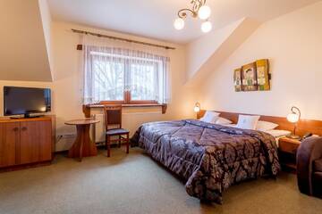 Фото номера Двухместный номер с 1 кроватью Отель Hotel - Karczma Klimtówka г. Wolbrom 4
